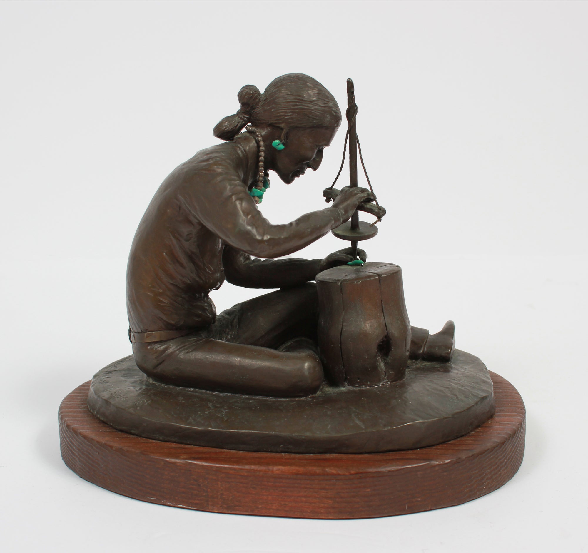 <i>The Bead Maker</i> <br>Bronze with Turquoise on Wood <br><br>#A9269