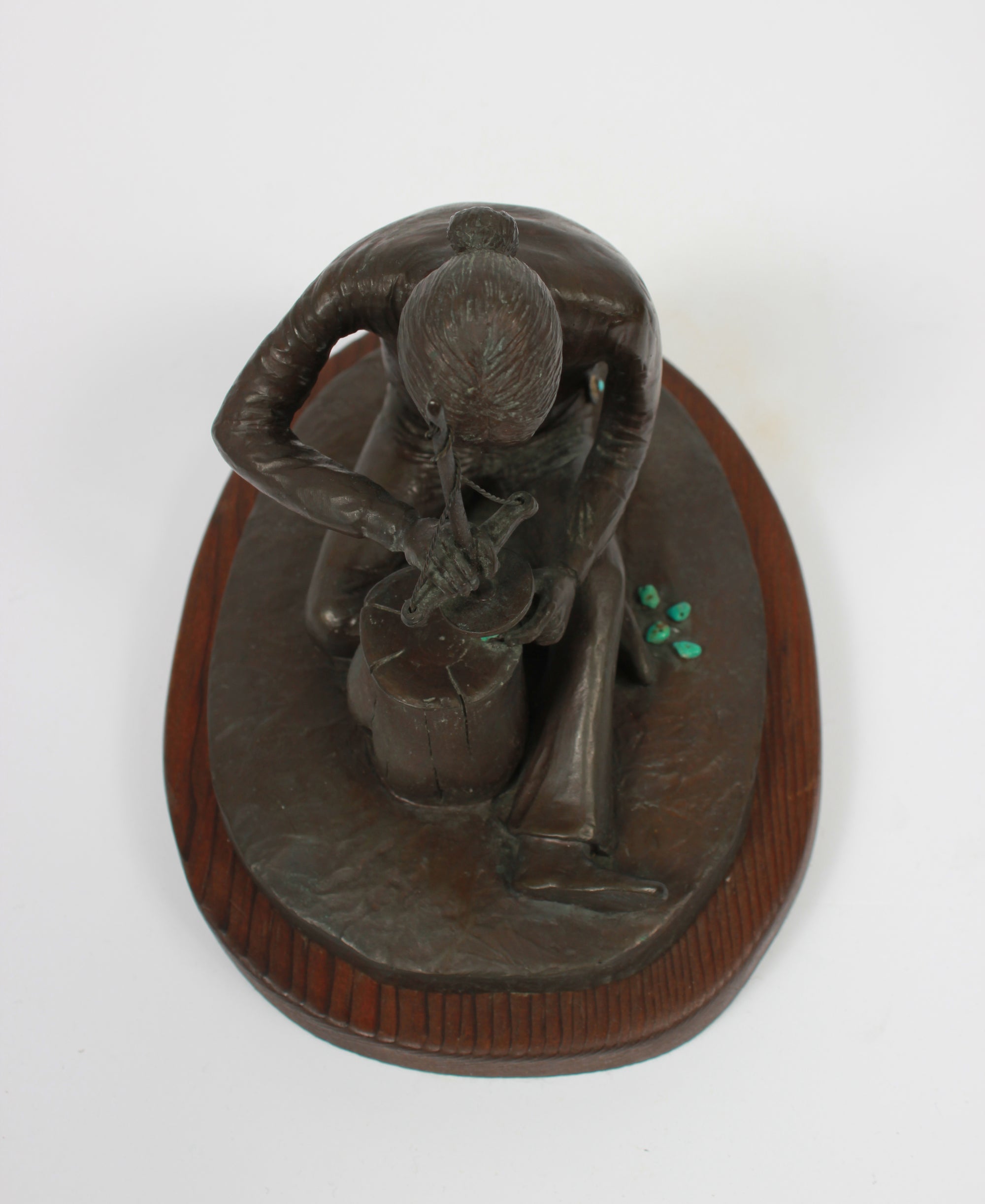 <i>The Bead Maker</i> <br>Bronze with Turquoise on Wood <br><br>#A9269