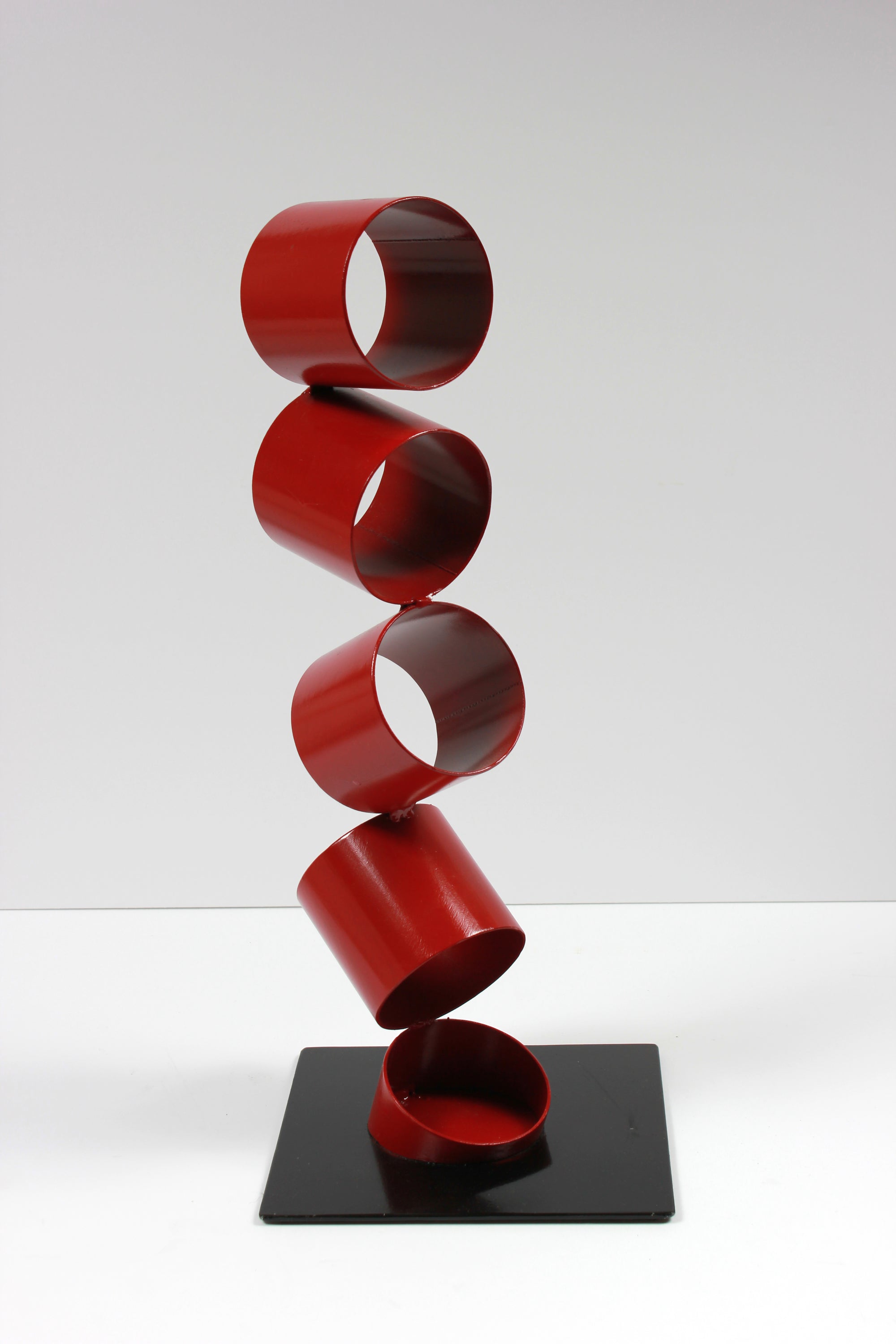 Six Red Rings in an Angled Stack <br>Multimedia Metal Sculpture <br><br>#A9336