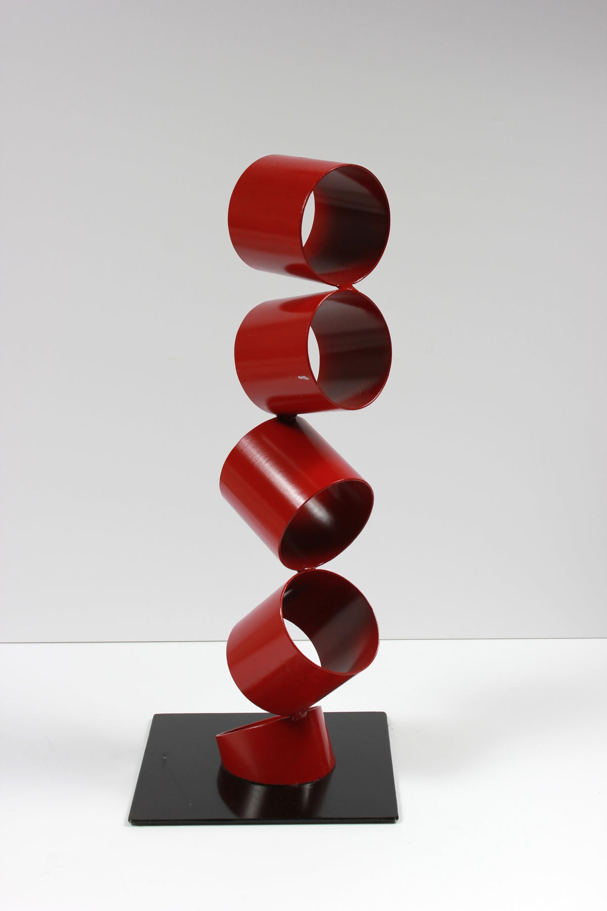 Six Red Rings in an Angled Stack <br>Multimedia Metal Sculpture <br><br>#A9336