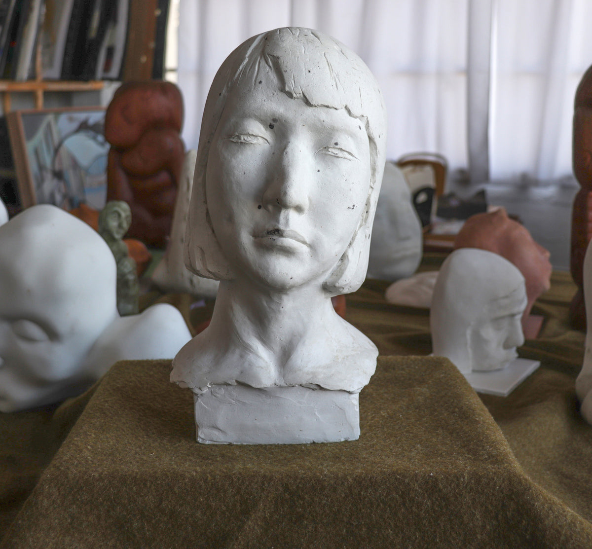 Thoughtful Feminine Bust <br>20th Century Plaster <br><br>#C2785