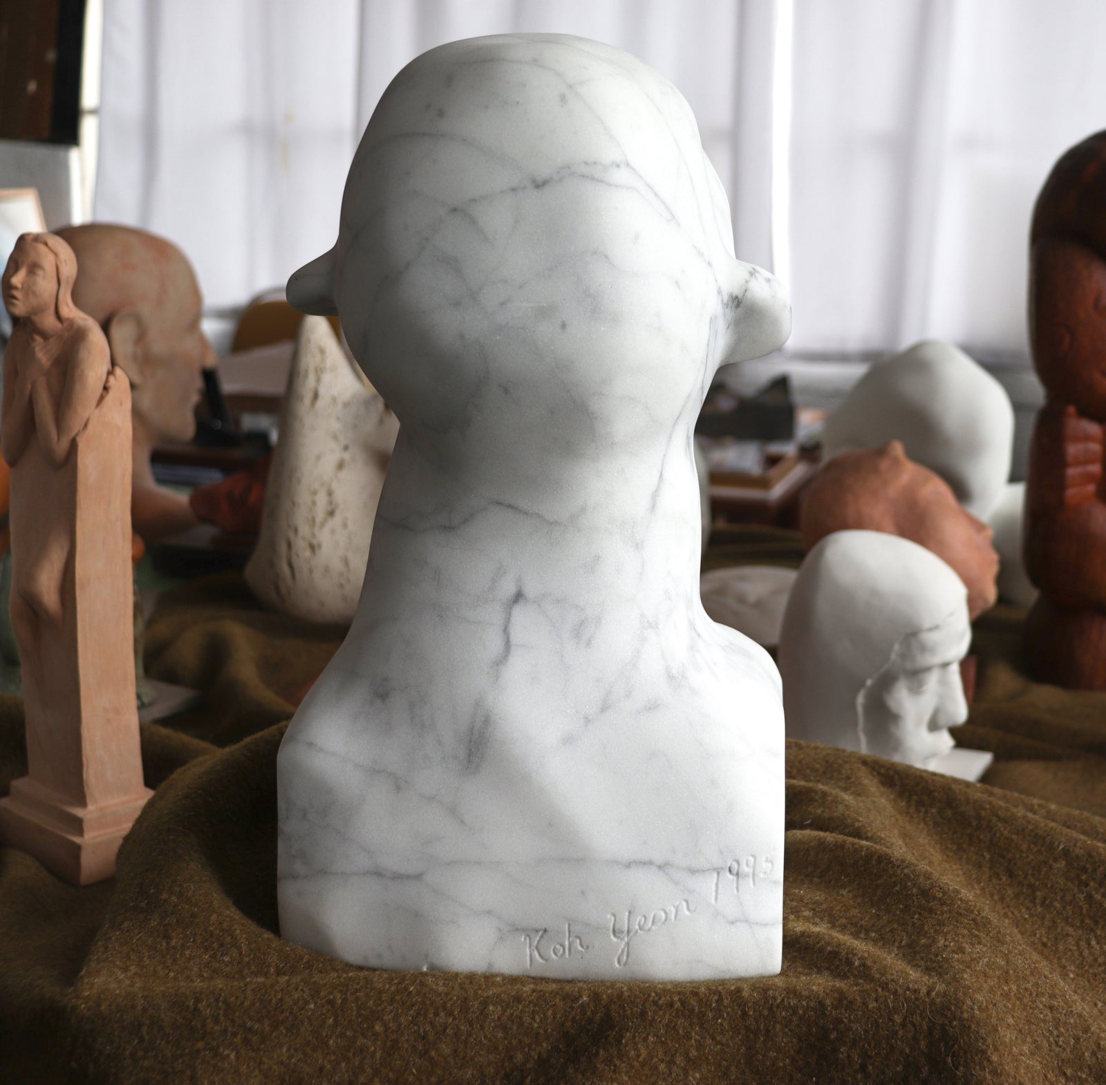 Weeping Statue Looking Up <br> 1995 Carrara Marble <br><br> #C2827