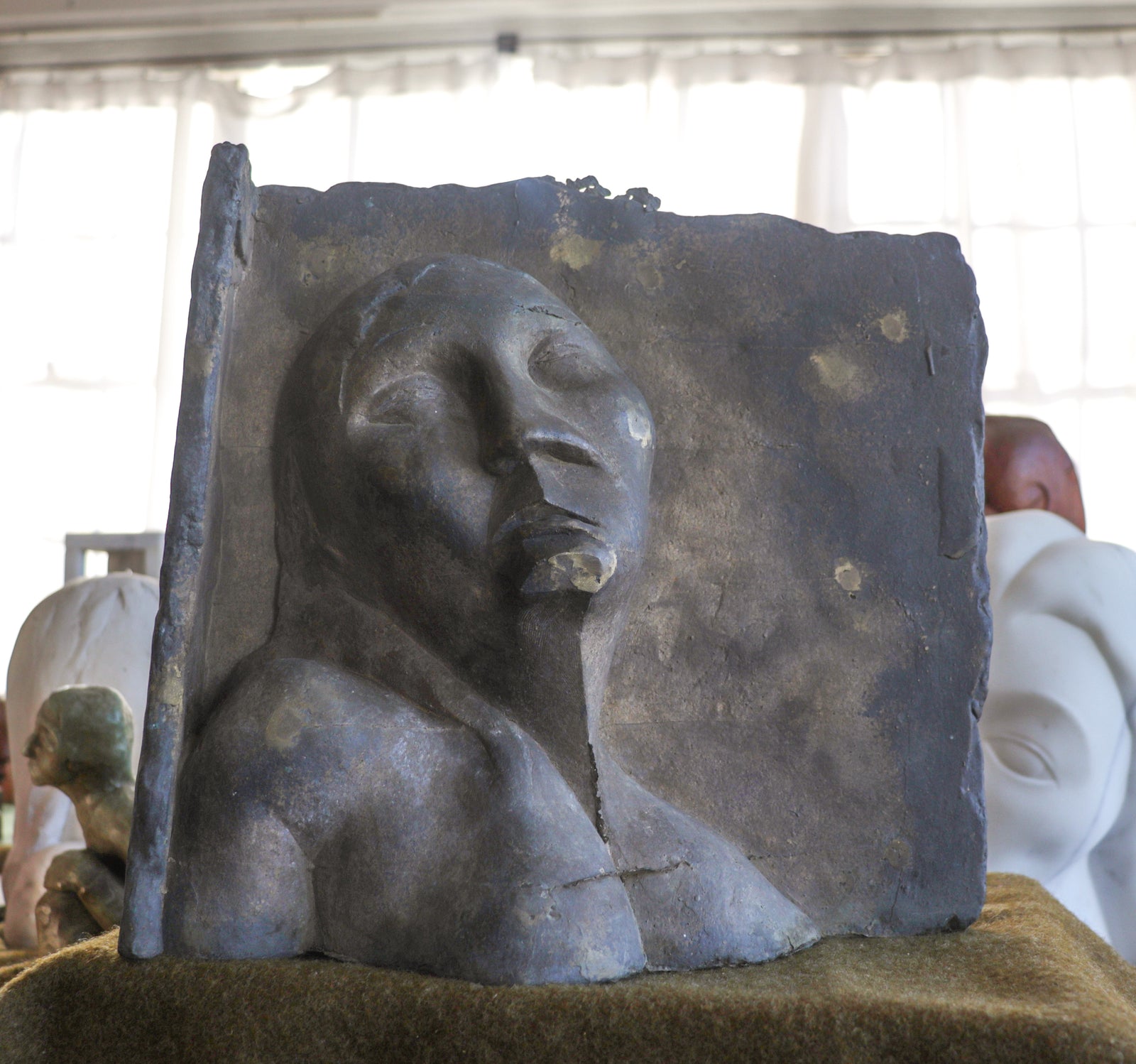 Emerging Restful Figure <br>20th Century Brass Plate <br><br>#C2973