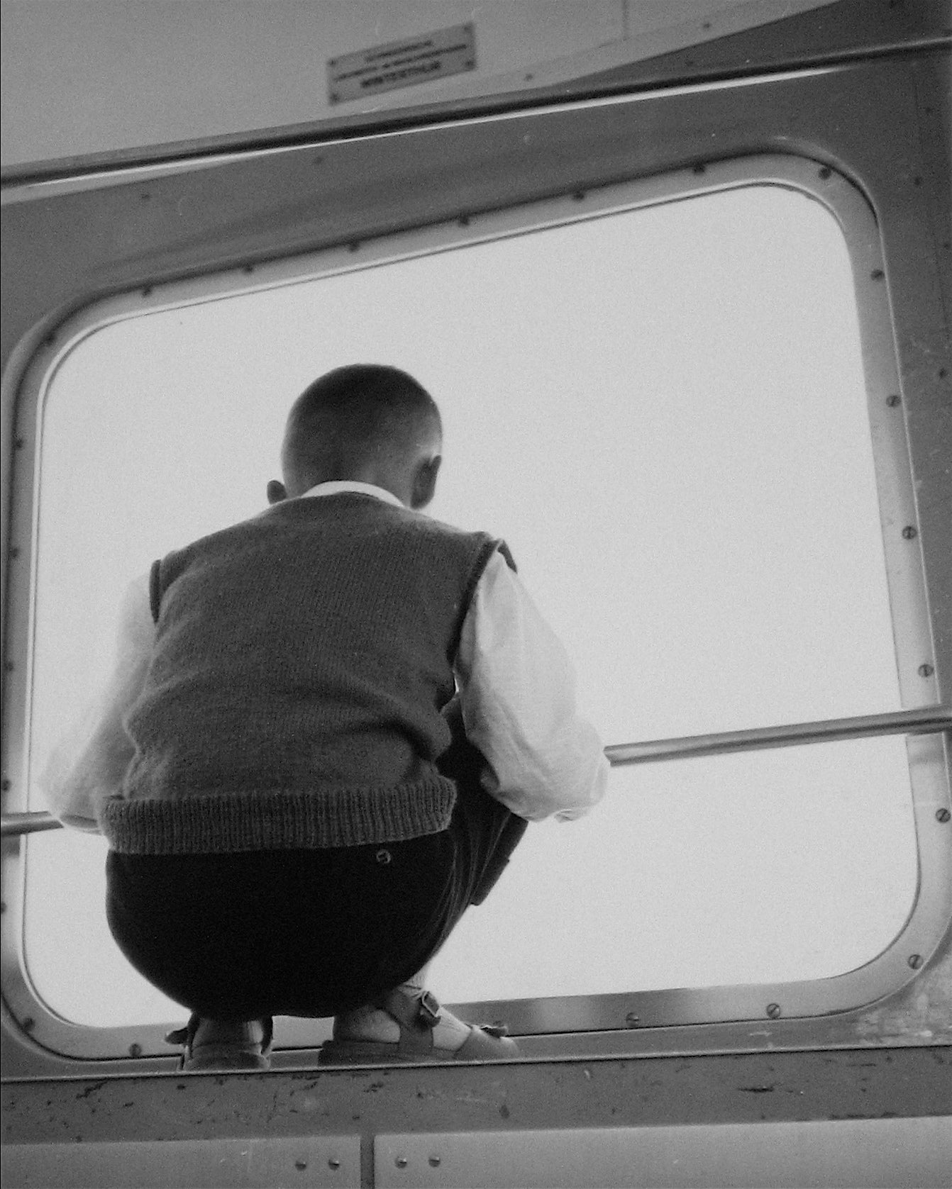 Boy on the Train, Switzerland <br>1960s Silver Gelatin Print <br><br>#12150